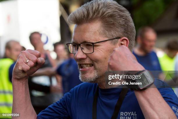 Lord Mayor of Copenhagen Frank Jensen cheers after finishing the Royal Run on May 21, 2018 in Copenhagen, Denmark. The Royal Run took place in the...