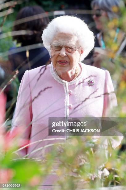Britain's Queen Elizabeth II visits the 2018 Chelsea Flower Show in London on May 21, 2018. The Chelsea flower show, held annually in the grounds of...