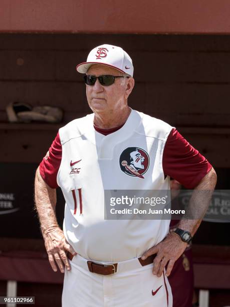 Head Coach Mike Martin of the Florida State Seminoles in the dugout before being honored as college baseball's all-time winningest coach prior to the...