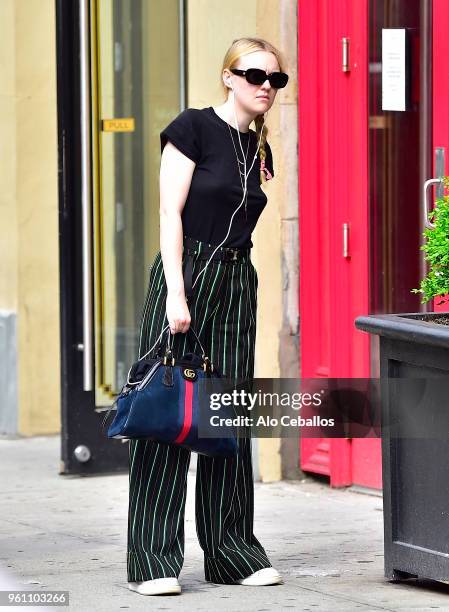 Dakota Fanning is seen in Soho on May 21, 2018 in New York City.