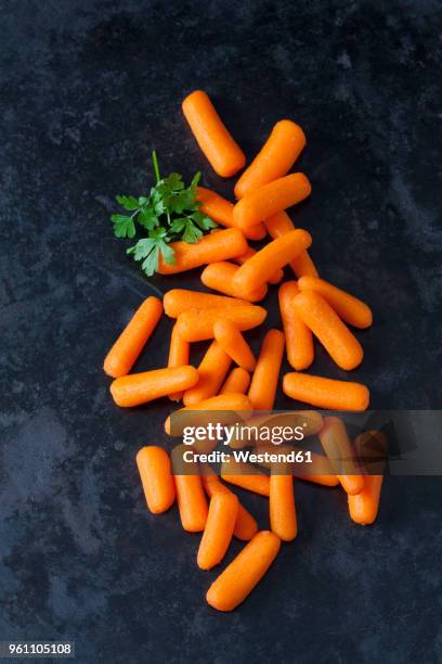 baby carrots - flat leaf parsley stock pictures, royalty-free photos & images