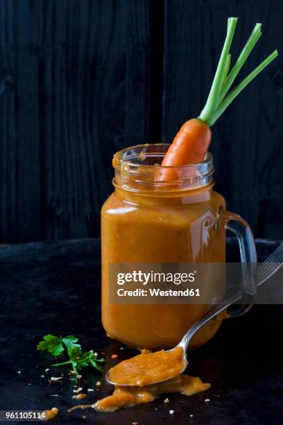 carrot soup and carrot in a glass - slätpersilja bildbanksfoton och bilder