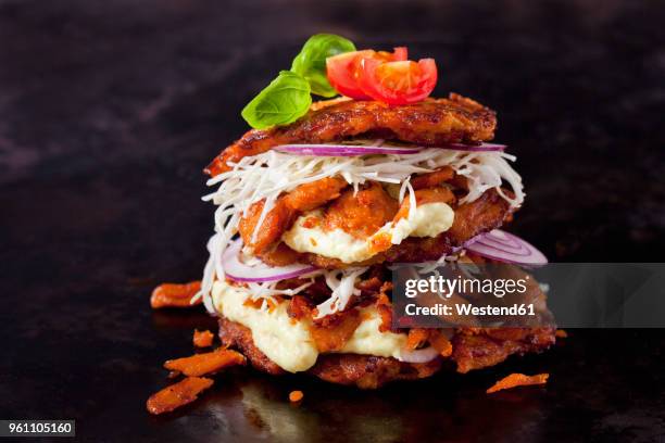 veggie burger made of potato fritters, sweet potatoes, soy meat, remoulade and barbecue sauce - sweet potato pancakes stock pictures, royalty-free photos & images