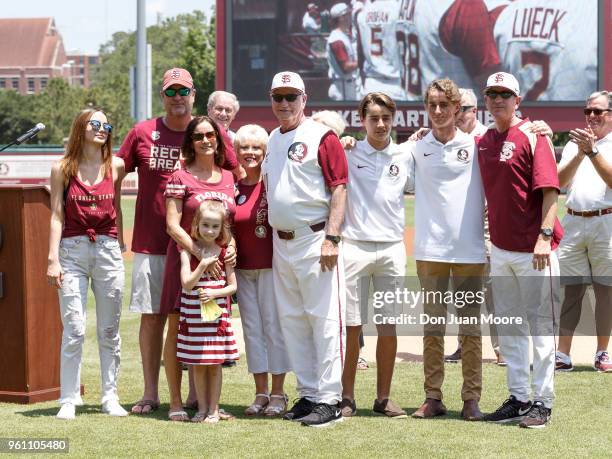 Head Coach Mike Martin of the Florida State Seminoles poses with his entire family while being honored as college baseball's all-time winningest...