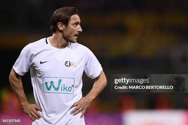 Former Italian football player Francesco Totti looks on during the "Notte del Maestro" , a football match celebrating the end of former Italy's...