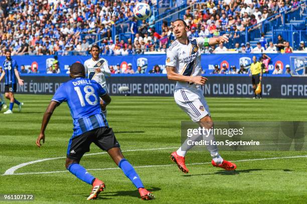 Los Angeles Galaxy forward Zlatan Ibrahimovic tracks the ball in the air during the LA Galaxy versus the Montreal Impact game on May 21 at Stade...