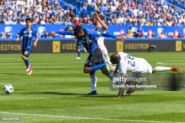 Los Angeles Galaxy defender Michael Ciani tries to trip Montreal Impact midfielder Raheem Edwards during the LA Galaxy versus the Montreal Impact...