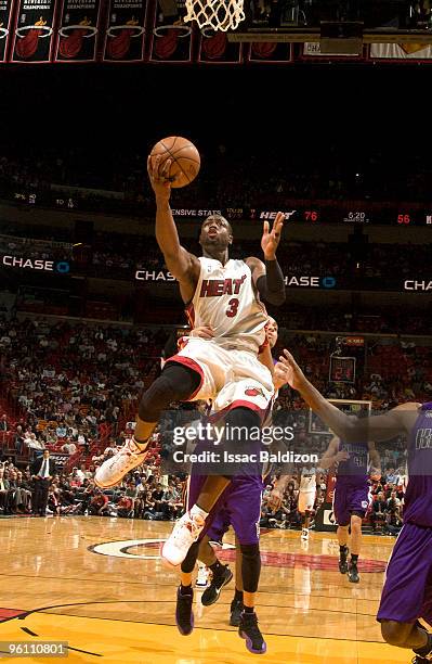 Dwyane Wade of the Miami Heat shoots against the Sacramento Kings on January 23, 2010 at American Airlines Arena in Miami, Florida. NOTE TO USER:...