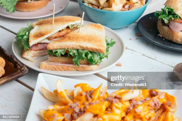 table full of american food - toasted bread stock-fotos und bilder