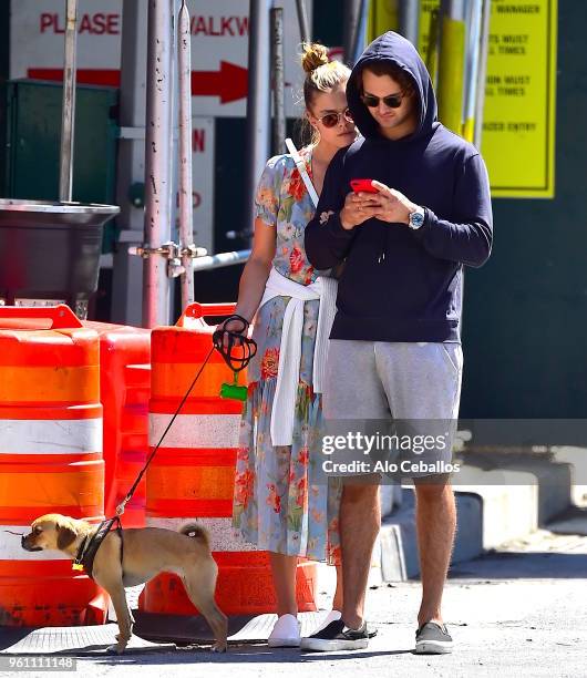 Nina Agdal and Jack Brinkley Cook are seen in the Meat Packing District on May 21, 2018 in New York City.