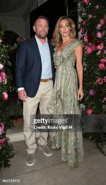 Guy Ritchie and Jacqui Ainsley seen attending Annabel's x Dior dinner to celebrate the RHS Chelsea Flower Show on May 21, 2018 in London, England.