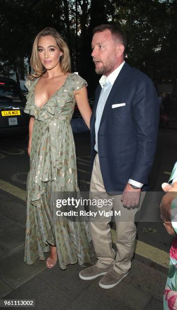 Guy Ritchie and Jacqui Ainsley seen attending Annabel's x Dior dinner to celebrate the RHS Chelsea Flower Show on May 21, 2018 in London, England.