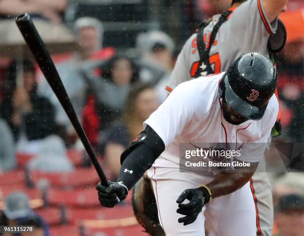 Boston Red Sox player Jackie Bradley Jr. Slams his bat into the ground after striking out during the seventh inning. The Boston Red Sox host the...