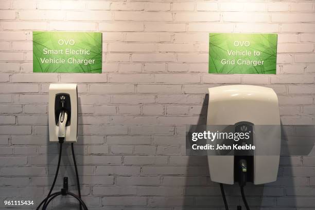 An OVO Smart Electric Vehicle Charger and a Vehicle to Grid Charger are displayed during the London Motor Show at ExCel on May 17, 2018 in London,...