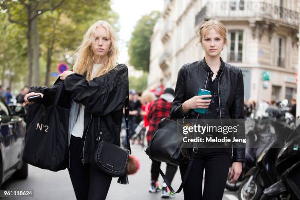 Models Jessie Bloemendaal and Paula Galecka after the Valentino show at Hotel Salomon Rothschild on October 02, 2016 in Paris, France. Jessie wears a...