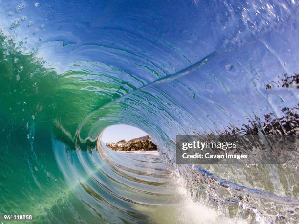 close-up of rolling surf on sea - laguna beach californië stockfoto's en -beelden