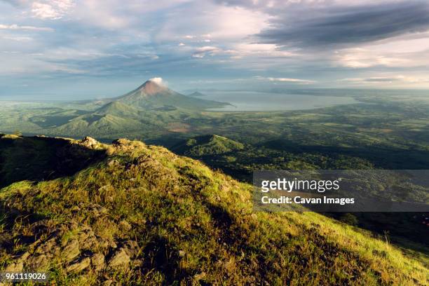 aerial view of concepcion volcano green landscape against cloudy sky - nicaragua ストックフォトと画像