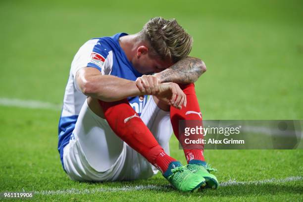 Manuel Janzer of Kiel reacts after the Bundesliga Playoff Leg 2 match between Holstein Kiel and VfL Wolfsburg at Holstein-Stadion on May 21, 2018 in...