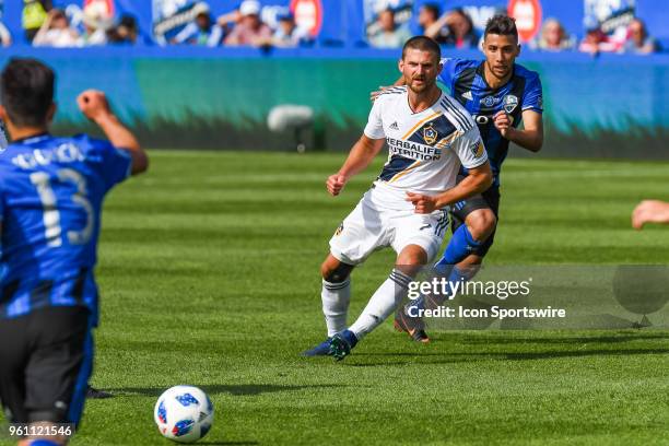 Los Angeles Galaxy midfielder Perry Kitchen looks at the ball getting away during the LA Galaxy versus the Montreal Impact game on May 21 at Stade...