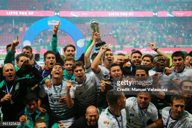 Players of Santos celebrate with the Championship Trophy after the Final second leg match between Toluca and Santos Laguna as part of the Torneo...