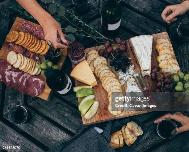 high angle view of friends having breakfast - cheese board photos et images de collection