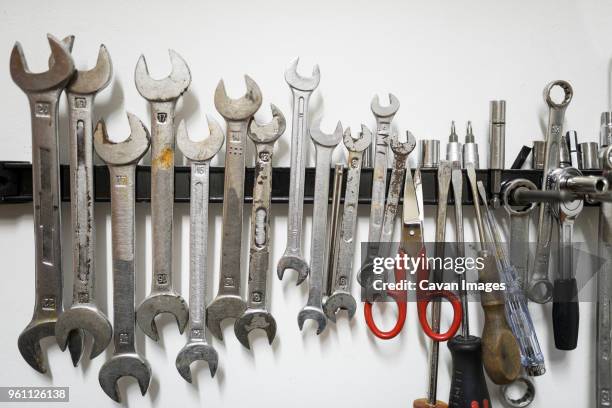 close-up of work tools on magnet at workshop - magnetwand stock-fotos und bilder