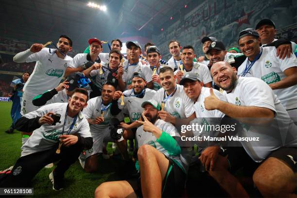 Players of Santos pose with the Championship Trophy after the Final second leg match between Toluca and Santos Laguna as part of the Torneo Clausura...