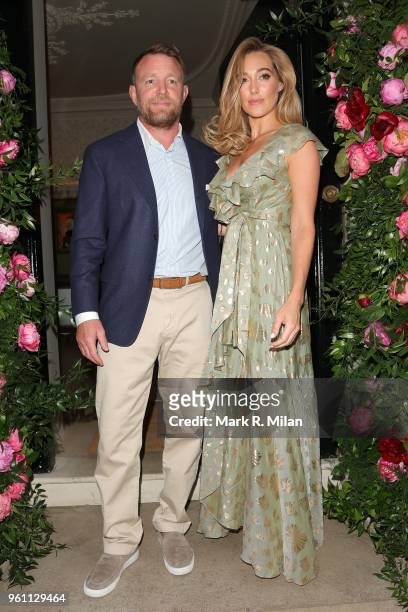 Guy Ritchie and Jacqui Ritchie arriving at Annabel's for the Dior Chelsea Flower show party on May 21, 2018 in London, England.