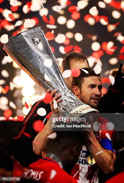 Gabi of Athletico Madrid holds the trophy during the UEFA Europa League Final between Olympique de Marseille and Club Atletico de Madrid at Stade de...