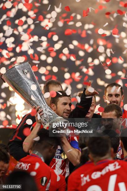 Gabi of Athletico Madrid holds the trophy during the UEFA Europa League Final between Olympique de Marseille and Club Atletico de Madrid at Stade de...