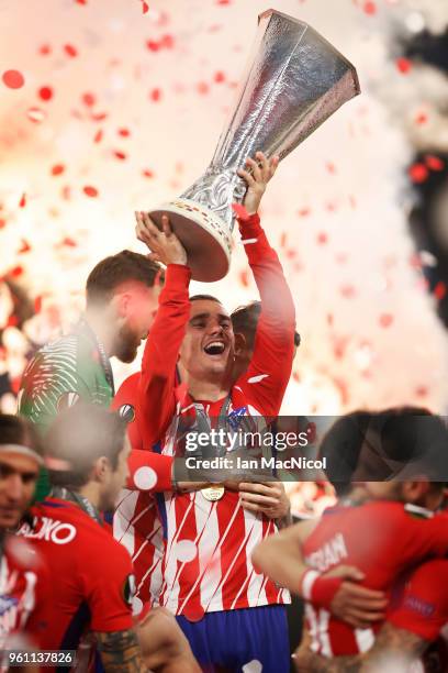 Antoine Griezmann of Athletico Madrid holds the trophy during the UEFA Europa League Final between Olympique de Marseille and Club Atletico de Madrid...