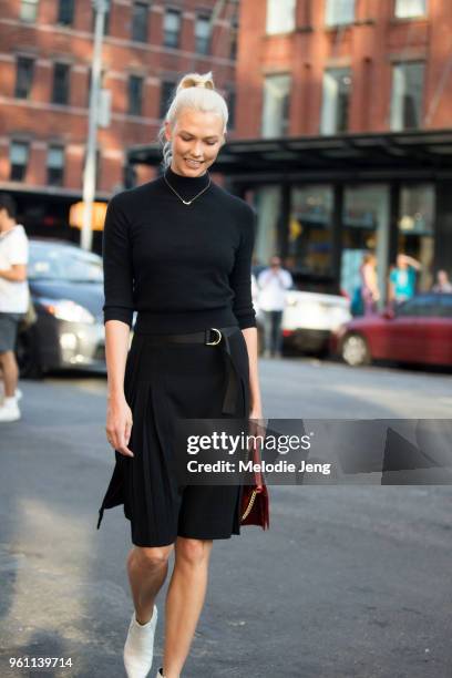 Model Karlie Kloss attends the Diane Von Furstenberg presentation in all black during New York Fashion Week Spring/Summer 2018 on September 10, 2017...