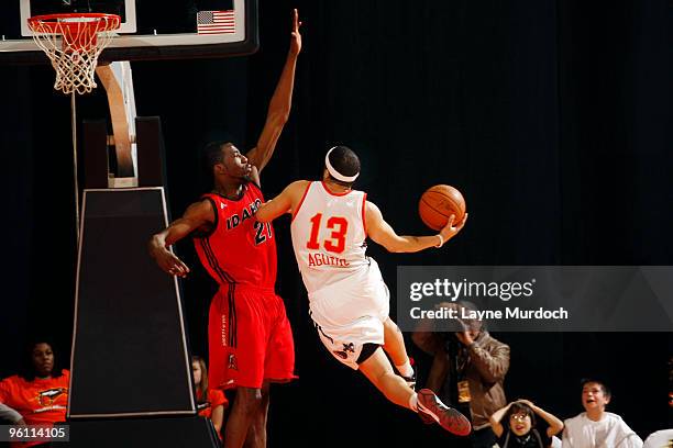 Antoine Agudio of the Albuquerque Thunderbirds hits the game winning shot against Yemi Ogunoye of the Idaho Stampede during the NBA D-League game on...
