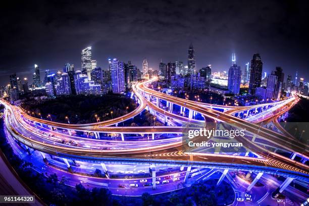 fisheye view of illuminated road intersection - yongyuan stock pictures, royalty-free photos & images