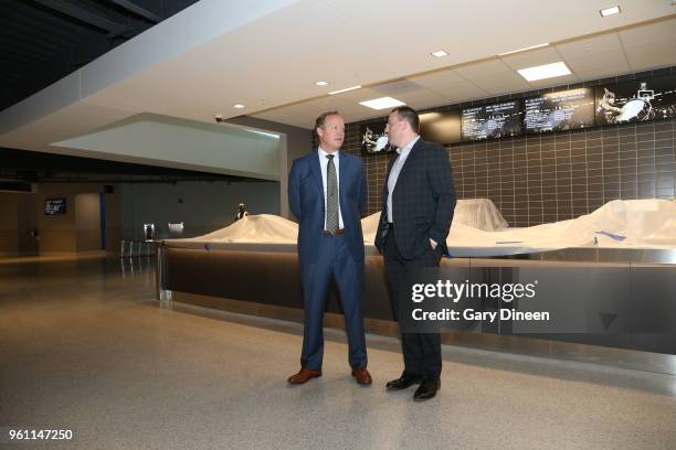 Milwaukee Bucks general manager Jon Horst introduces Mike Budenholzer as the team's new head coach during a press conference at the Wisconsin...