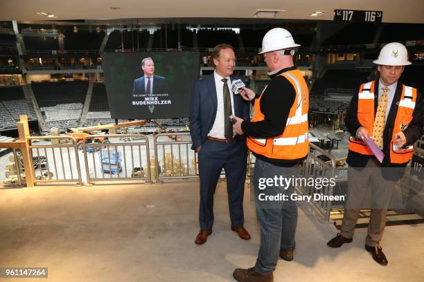 Milwaukee Bucks general manager Jon Horst introduces Mike Budenholzer as the team's new head coach during a press conference at the Wisconsin...