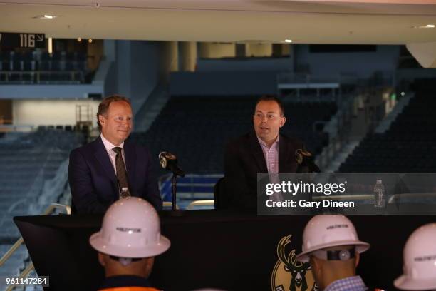 Milwaukee Bucks general manager Jon Horst introduces Mike Budenholzer as the team's new head coach during a press conference at the Wisconsin...