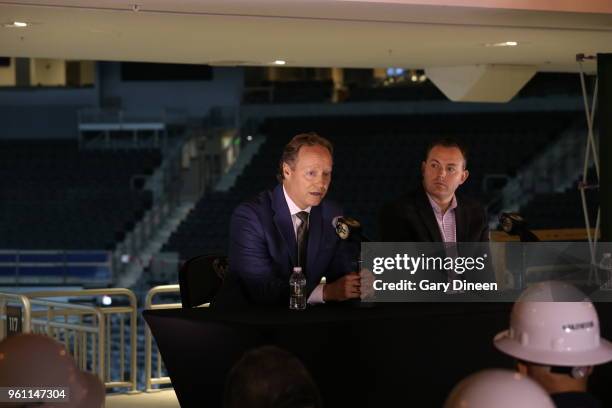 Milwaukee Bucks general manager Jon Horst introduces Mike Budenholzer as the team's new head coach during a press conference at the Wisconsin...