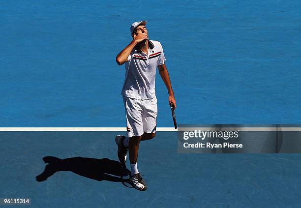 Ivo Karlovic of Croatia celebrates winning the second set in his fourth round match against Rafael Nadal of Spain during day seven of the 2010...