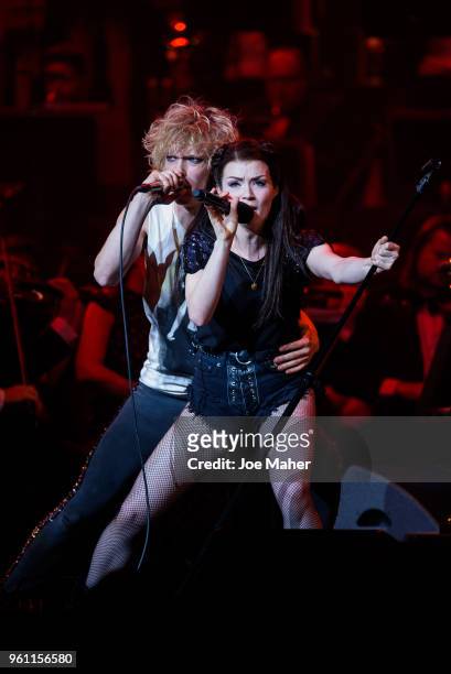 Andrew Polec and Christina Bennington sing 'Bat out of hell' at 'Magic At The Musicals' concert, held at Royal Albert Hall on May 21, 2018 in London,...