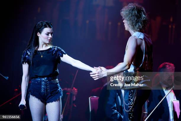 Christina Bennington and Andrew Polec sing 'Bat out of hell' at 'Magic At The Musicals' concert, held at Royal Albert Hall on May 21, 2018 in London,...
