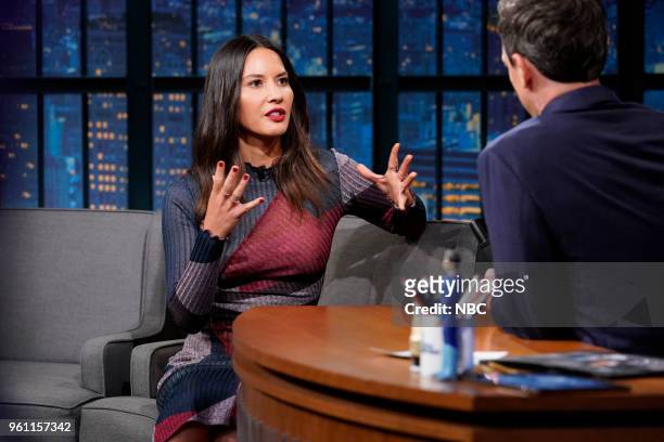 Episode 690 -- Pictured: Actress Olivia Munn during an interview with host Seth Meyers on May 21, 2018 --