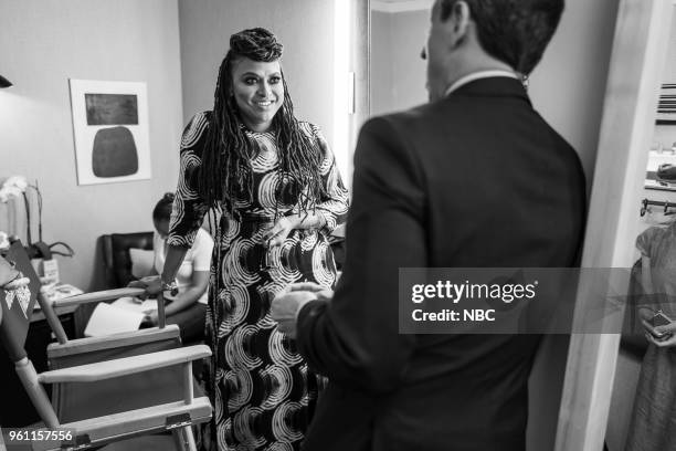 Episode 690 -- Pictured: Director Ava DuVernay talks with host Seth Meyers backstage on May 21, 2018 --