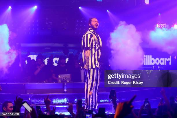 Post Malone performs onstage at the 2018 Billboard Music Awards official after party at Hakkasan Nightclub presented by Security Benefit at MGM Grand...