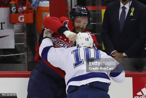 Miller of the Tampa Bay Lightning and Brooks Orpik of the Washington Capitals fight in the first period of Game Six of the Eastern Conference Finals...