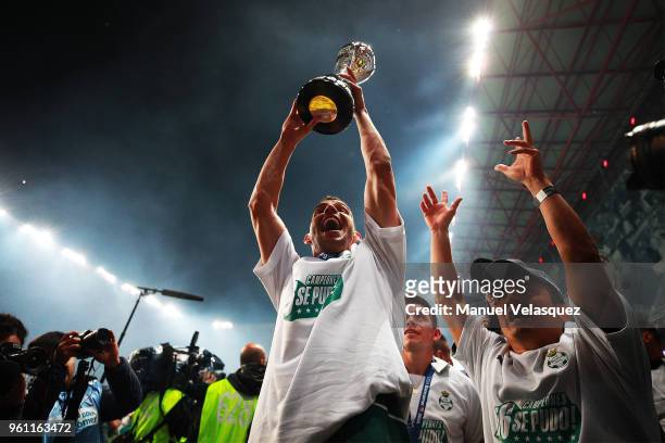 Gerardo Alcoba of Santos lifts the trophy to celebrate after the Final second leg match between Toluca and Santos Laguna as part of the Torneo...