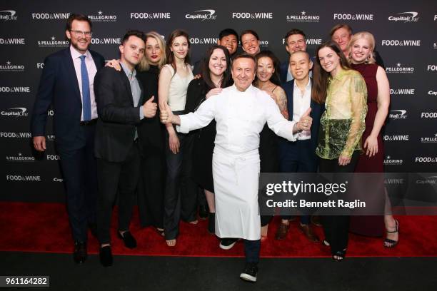 Chef Daniel Boulud poses in front of Hunter Lewis, Brady Williams, Jess Shadbolt, Diana Davila, Clare de Boer, Kate Williams, Kevin Tien, Katianna...