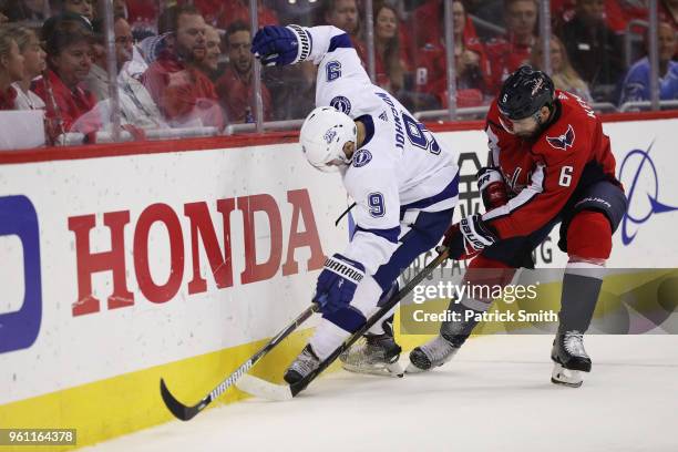 Michal Kempny of the Washington Capitals skates against Tyler Johnson of the Tampa Bay Lightning in the first period of Game Six of the Eastern...