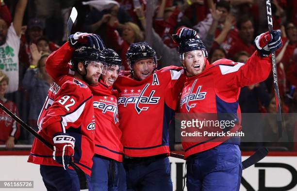 Oshie of the Washington Capitals celebrates his second period goal against the Tampa Bay Lightning with teammates in Game Six of the Eastern...