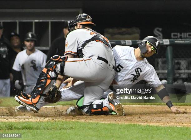 Yolmer Sanchez of the Chicago White Sox is tagged out at home plate Andrew Susac of the Baltimore Orioles during the fifth inning on May 21, 2018 at...